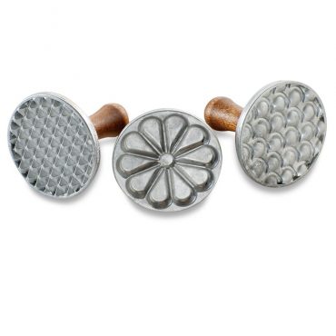Three wooden-handled cookie stamps with decorative seasonal designs including snowflake and leaf patterns
