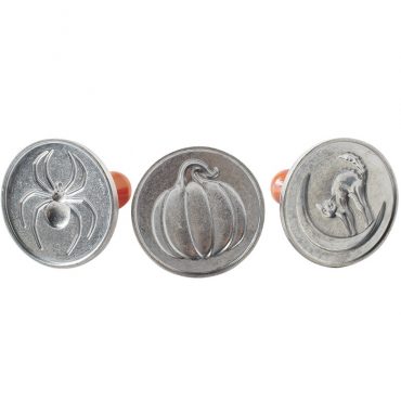 Nordic Ware Halloween cookie stamps set featuring four wooden handles with carved designs including pumpkin, ghost, and bat motifs