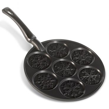 Nordic Ware aluminum pancake pan with six snowflake-shaped wells, cast aluminum construction, natural finish