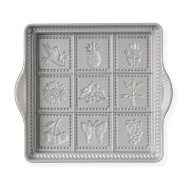 Nordic Ware aluminum shortbread pan with 8 triangular wedge impressions, natural silver finish, interior view