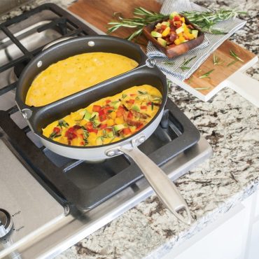 Nordic Ware aluminum frittata pan with hinged lid, round dual-sided cookware in natural silver finish