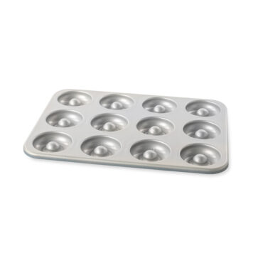 Nordic Ware mini donut pan in twilight blue with 12 donut-shaped cavities, non-stick aluminum baking mold