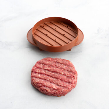 Nordic Ware aluminum stuffed burger maker with two-piece press design, showing formed round patty