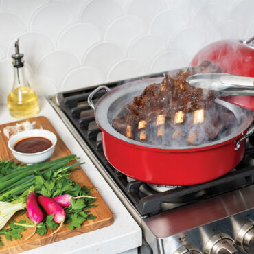 Indoor/Outdoor Kettle Smoker on stovetop with smoked ribs