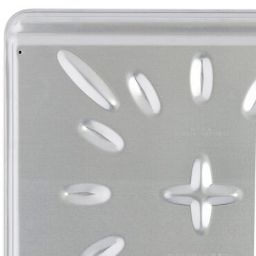 Nordic Ware aluminum insulated baking sheet showing double-layer construction underneath, natural silver finish