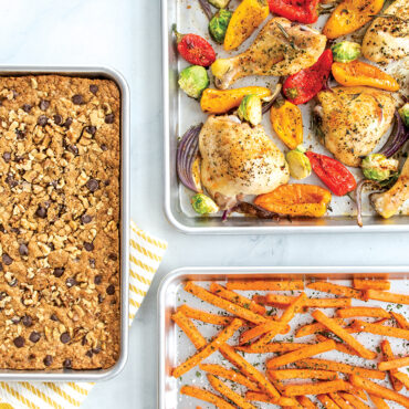 Nordic Ware aluminum baking pans showing roasted chicken with vegetables, chocolate chip bars, and seasoned fries