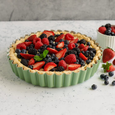Berry tart with fresh strawberries and blackberries in Nordic Ware green fluted quiche and tart pan