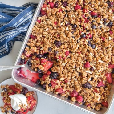 Golden berry crisp with nuts and dried fruit baked in Nordic Ware aluminum high-sided sheet cake pan