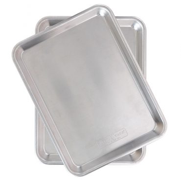 Two Nordic Ware aluminum quarter sheet baking pans with natural silver finish and raised rims