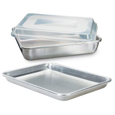 Three Nordic Ware Naturals aluminum baking pans stacked - half sheet, quarter sheet, and cooling rack with natural finish