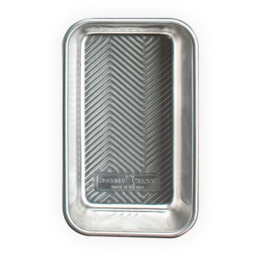 Nordic Ware Prism Loaf Pan, rectangular aluminum baking pan with geometric faceted sides, natural silver finish