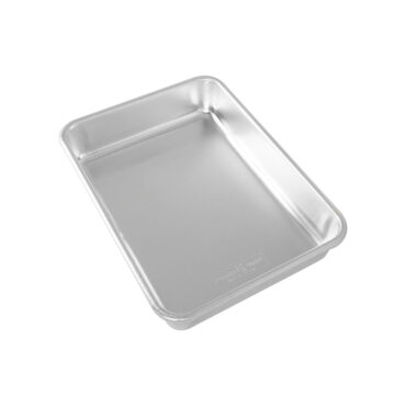 Nordic Ware Naturals aluminum 9x13 rectangular cake pan with natural silver finish and reinforced rim