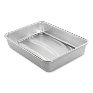 Nordic Ware Prism aluminum 9x13 rectangular baking pan with textured diamond pattern bottom, natural silver finish