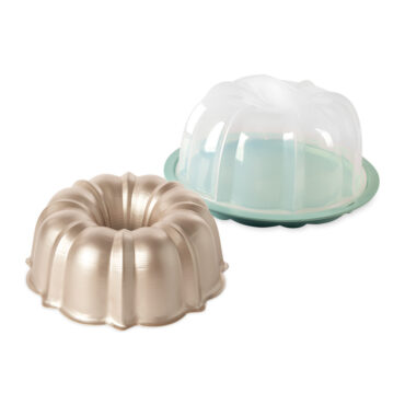 Nordic Ware aluminum bundt pan with translucent teal cake keeper dome, fluted tube design in natural finish