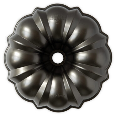 Nordic Ware Original ProCast aluminum bundt pan with fluted design, dark graphite nonstick interior and exterior
