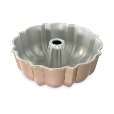 Nordic Ware cast aluminum bundt pan interior view, showing silver nonstick coating and fluted design
