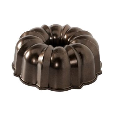 Nordic Ware cast aluminum Bundt pan with bronze exterior finish and fluted tube design