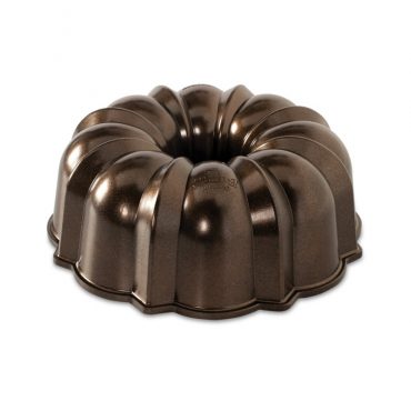 Nordic Ware cast aluminum Bundt pan with bronze exterior finish and fluted tube design
