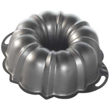 Nordic Ware ProForm aluminum bundt pan with side handles, fluted design, light silver finish