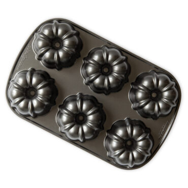 Nordic Ware aluminum Bundtlette pan with six fluted mini bundt cake molds, dark nonstick finish
