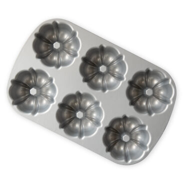 Nordic Ware aluminum Bundtlette pan with six fluted mini bundt cake molds, silver finish