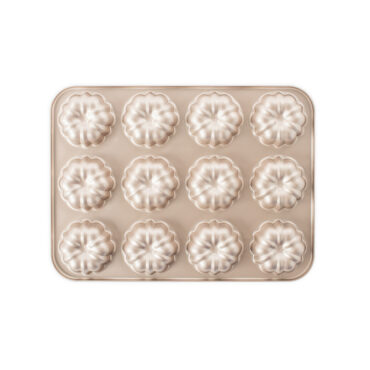 Nordic Ware aluminum mini bundt cupcake pan with 12 fluted cavities, champagne gold nonstick finish