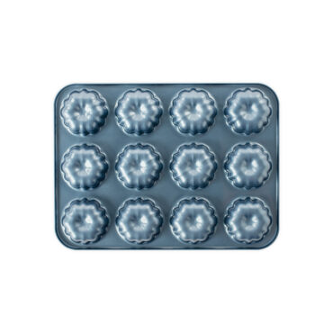Nordic Ware aluminum mini bundt cupcake pan in twilight blue with 12 fluted cavities, overhead view