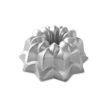 Nordic Ware aluminum Vintage Star bundt pan with geometric star-shaped fluted design, silver finish