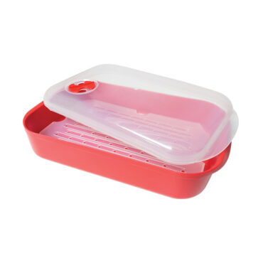 Nordic Ware aluminum steam cooker with perforated insert, lid open showing two-tier steaming system