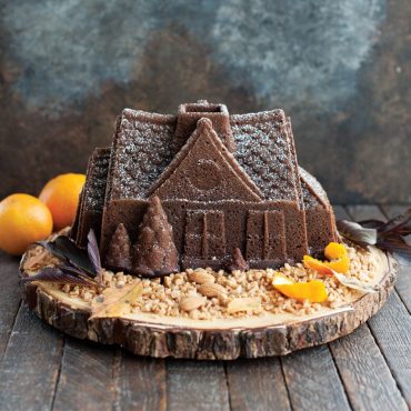 Nordic Ware aluminum Gingerbread House Bundt pan with detailed architectural design, silver finish