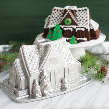 Nordic Ware aluminum gingerbread house bundt pan with intricate architectural details, silver finish