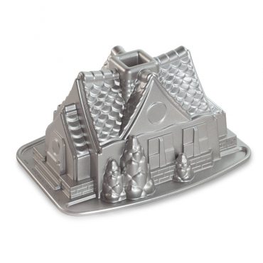 Nordic Ware aluminum bundt pan with gingerbread house design featuring detailed architectural texture