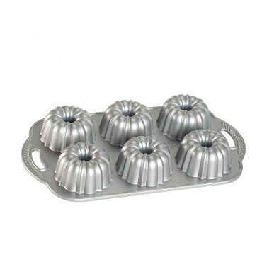 Nordic Ware Anniversary Bundtlette pan, aluminum mini bundt mold with decorative fluted design, silver finish