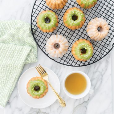 Six-cavity Nordic Ware Anniversary Bundtlette pan, cast aluminum with detailed fluted wells, natural silver finish
