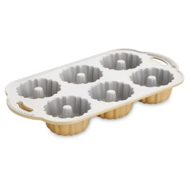 Nordic Ware Anniversary Bundtlette pan interior, six fluted aluminum cavities with gold exterior finish