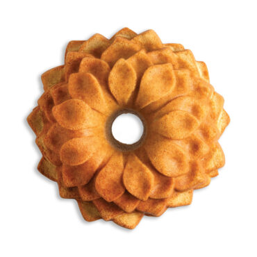 Overhead white sweep image of plain Blossom Bundt cake