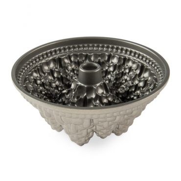 Nordic Ware Pine Forest Bundt pan interior showing silver nonstick coating and detailed tree-textured design
