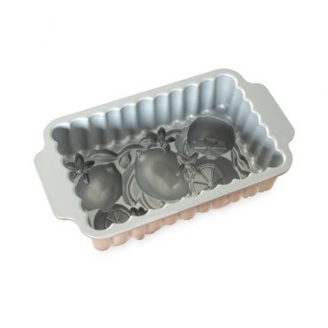 Nordic Ware aluminum loaf pan with citrus fruit and blossom design, scalloped edges, silver interior