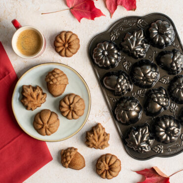 Plated Autumn Cakelets with mug of coffee and Pan with leaves