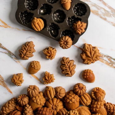 Overhead image of Autumn Cakelets arranged to be falling out of pan into a pile