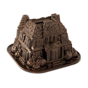 Nordic Ware aluminum bundt pan with haunted manor castle design, bronze nonstick exterior finish