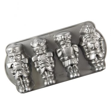 Nordic Ware aluminum cakelet pan with four detailed nutcracker soldier cavities, silver finish