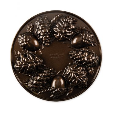 Nordic Ware Woodland Cakelet Pan, bronze aluminum with six tree-shaped cavities for individual cakes