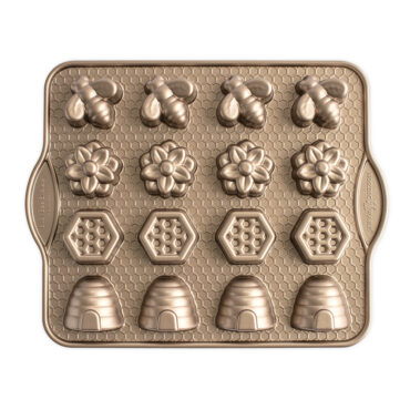 Nordic Ware aluminum bitelet pan with 16 bee-shaped cavities, toffee-colored nonstick coating, overhead view