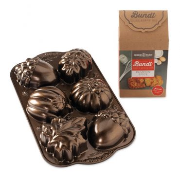 Nordic Ware aluminum autumn leaves baking pan with golden pumpkin quick bread loaves and spice mix package