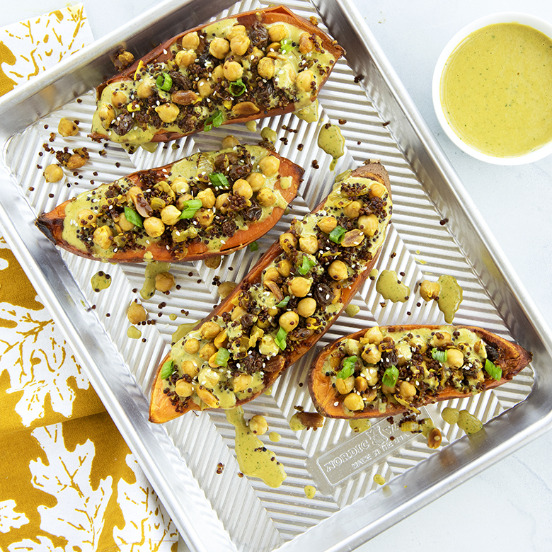 Visit Quinoa and Chickpea Stuffed Sweet Potatoes with Curry Peanut Sauce Recipe