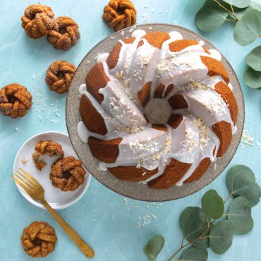 Six glazed mini bundt cakes with braided pattern from Nordic Ware aluminum pan, golden brown with white glaze