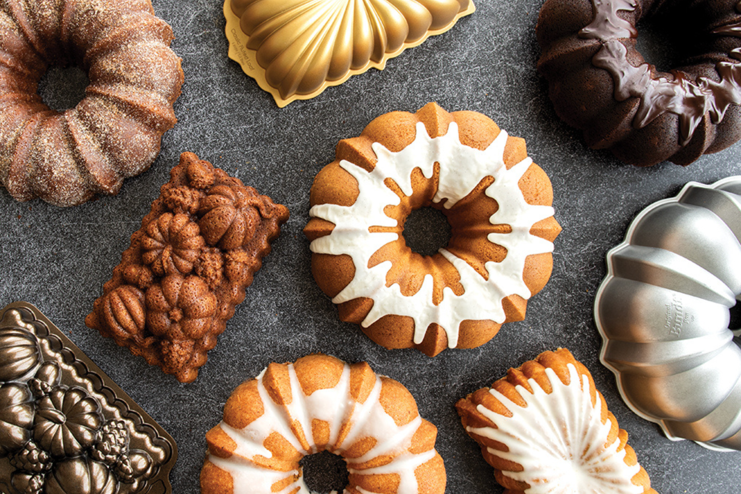 A bunch of different flavored Bundt cakes and loaves. 