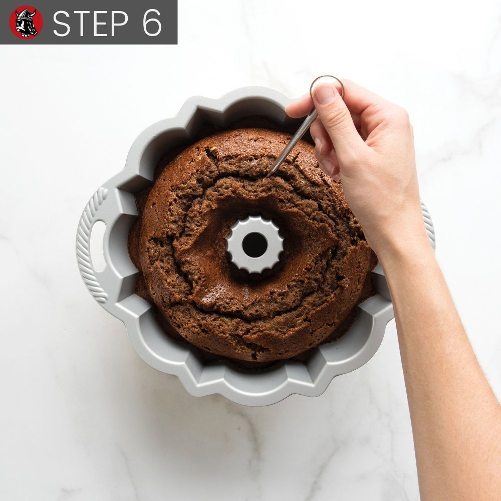Step 6 Testing baked Bundt with cake tester