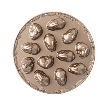 Nordic Ware aluminum baby bunny cakelet pan with 12 bunny-shaped cavities, silver finish, top view